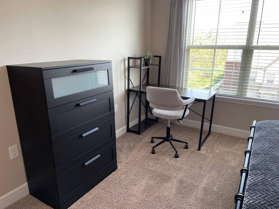 Plenty of dresser space to make yourself at home and a nice desk + office chair with nature view..