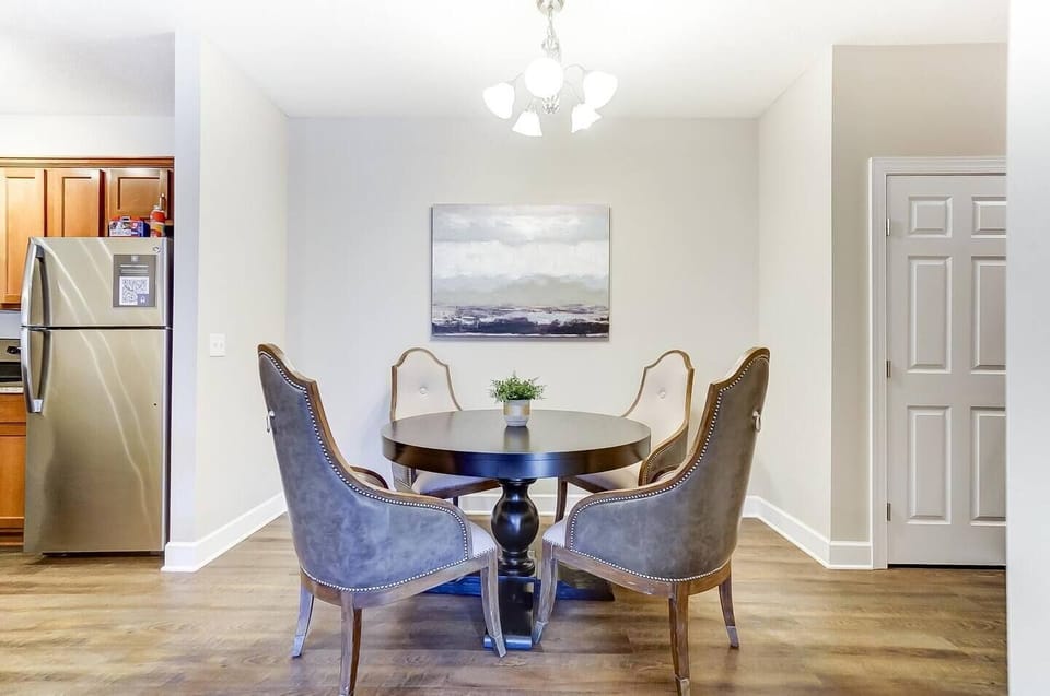 This dining area is perfect for morning coffee, a nice dinner, spreading out your paperwork, or even a competitive board game!