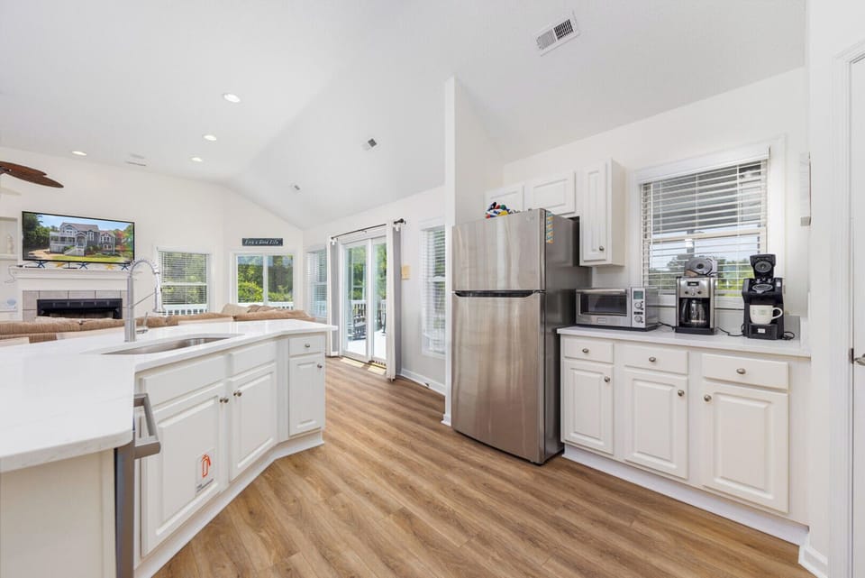 Kitchen Area with Bar Seating on Third Level