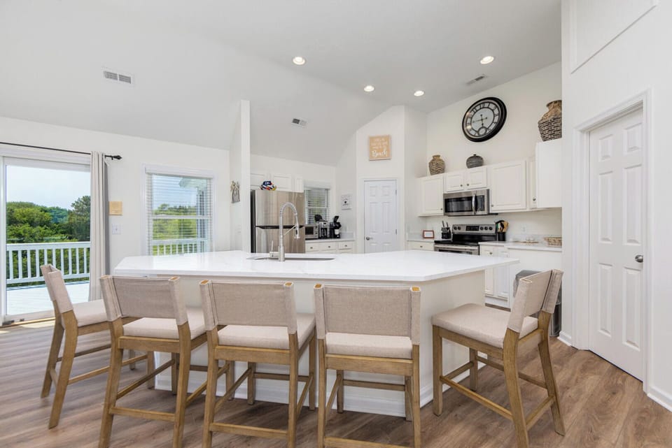 Kitchen Area with Bar Seating on Third Level