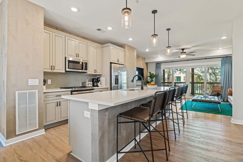 Kitchen Area with Bar Seating on Second Level