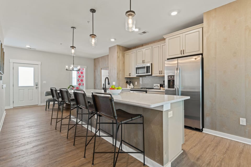 Kitchen Area with Bar Seating on Second Level