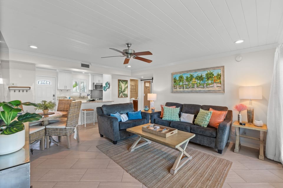 Sink into coastal comfort in your bright, open living space. Tropical accents and plush seating invite you to unwind after a day in the sun.