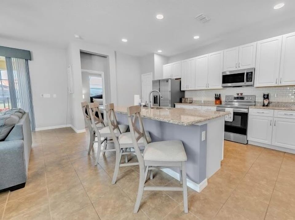Villa, 4 Bedrooms | Private kitchen | Microwave, coffee/tea maker, toaster, highchair