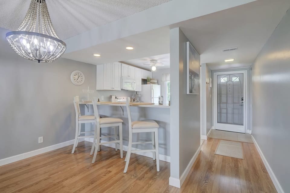 There are 3 bar Height Chairs at the Kitchen Counter