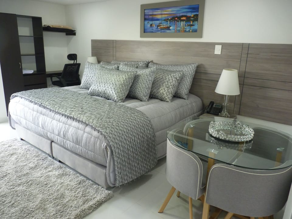 Junior Room | Premium bedding, down comforters, desk, soundproofing