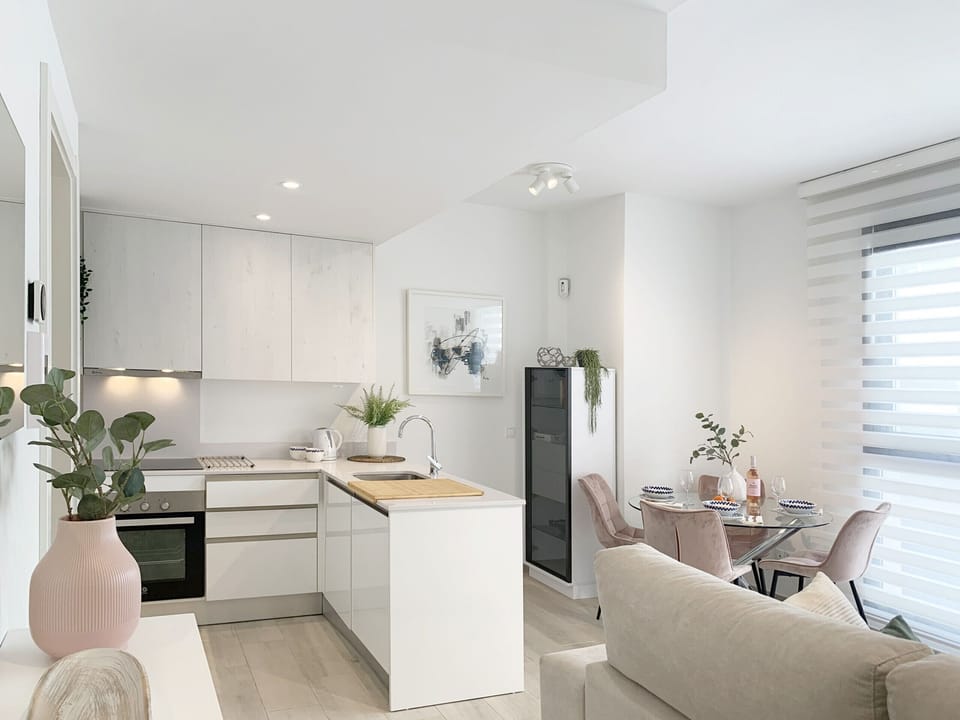 Comfy kitchen, equipped with stove, refrigerator and storage