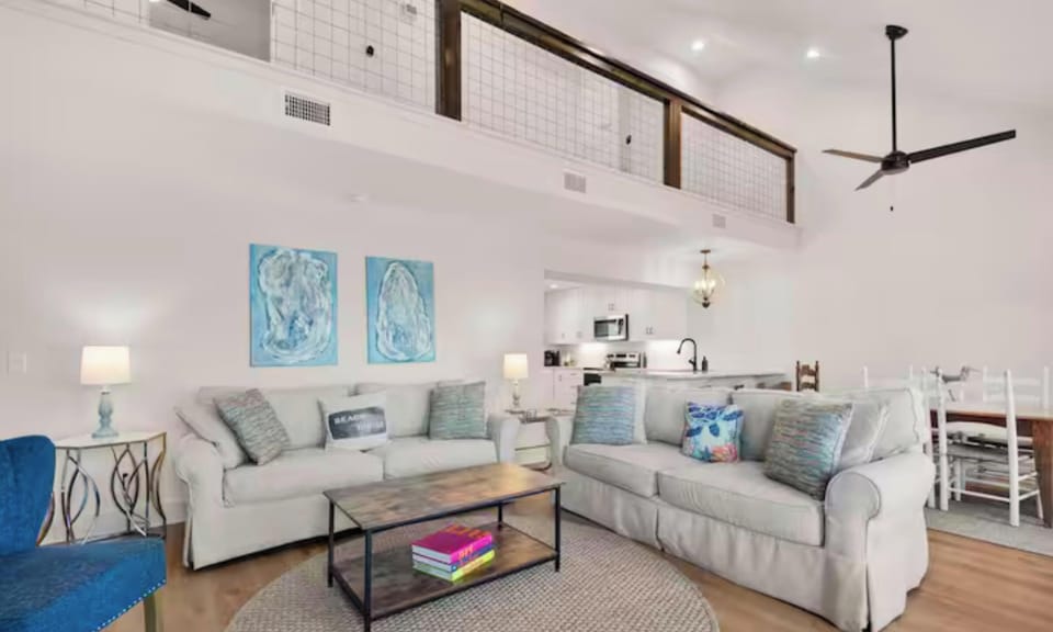 Relax in style beneath soaring ceilings and sunlight.