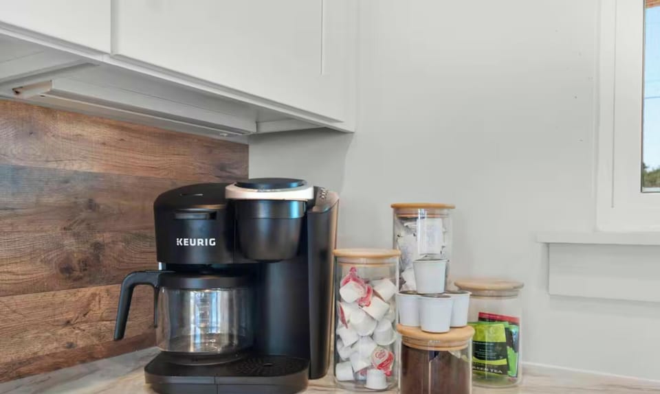 Convenient coffee station makes mornings effortlessly enjoyable.