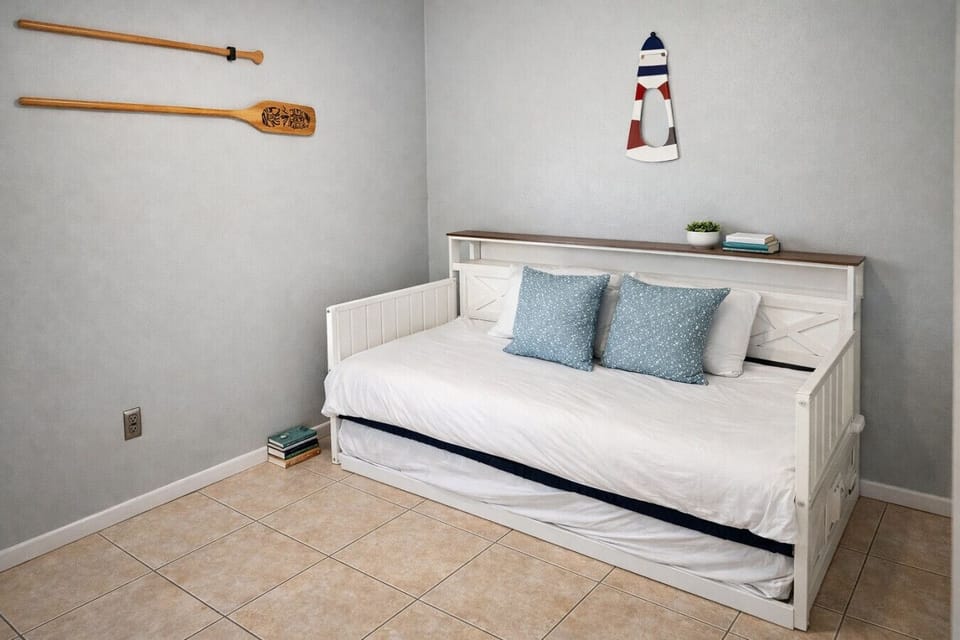 Bedroom 3: Twin day bed with a trundle bed.