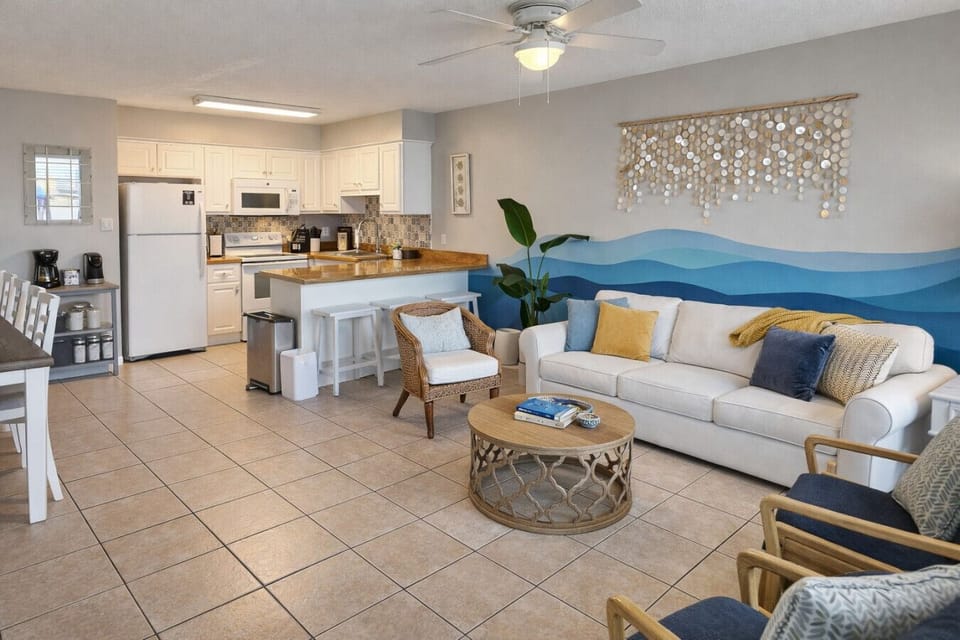 Spacious living area has plenty of seating for family and friends.