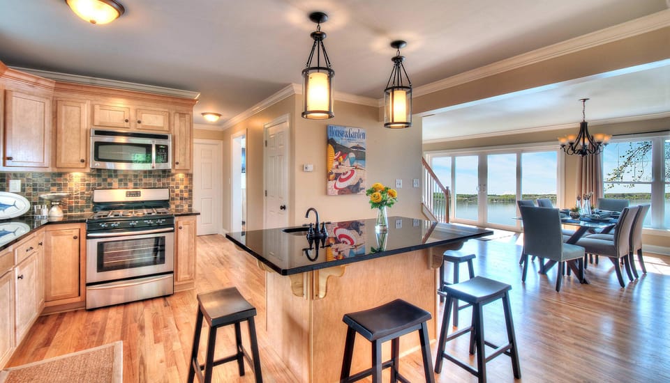 Beautiful kitchen with island with seating for 10