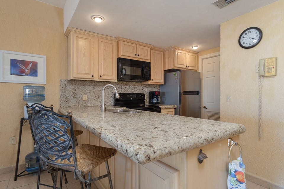 The kitchen is complete and well laid out.