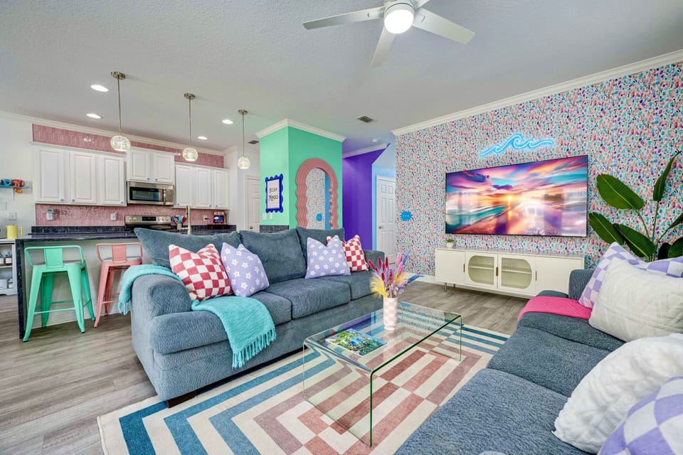 large open living room for family gatherings. Couch on right is a queen sleeper sofa.