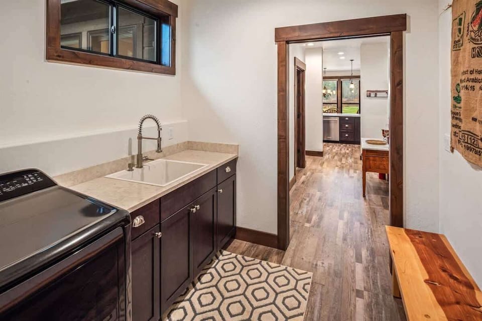 Full service laundry room with washer, dryer, with detergent and softener supplied