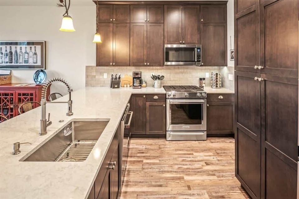 Fully appointed kitchen with additional bar seating