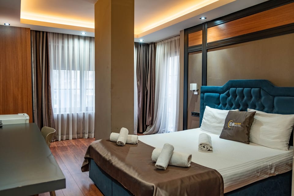 Standard Double or Twin Room | In-room safe, desk, laptop workspace, blackout drapes