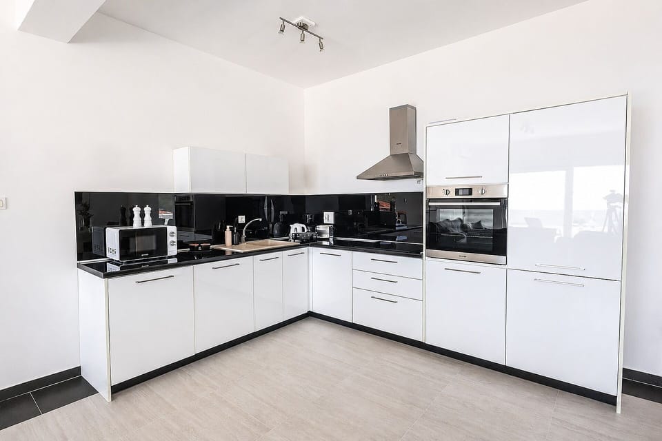 A great space for cooking, with microwave, dishwasher, hob, oven, toaster,juicer