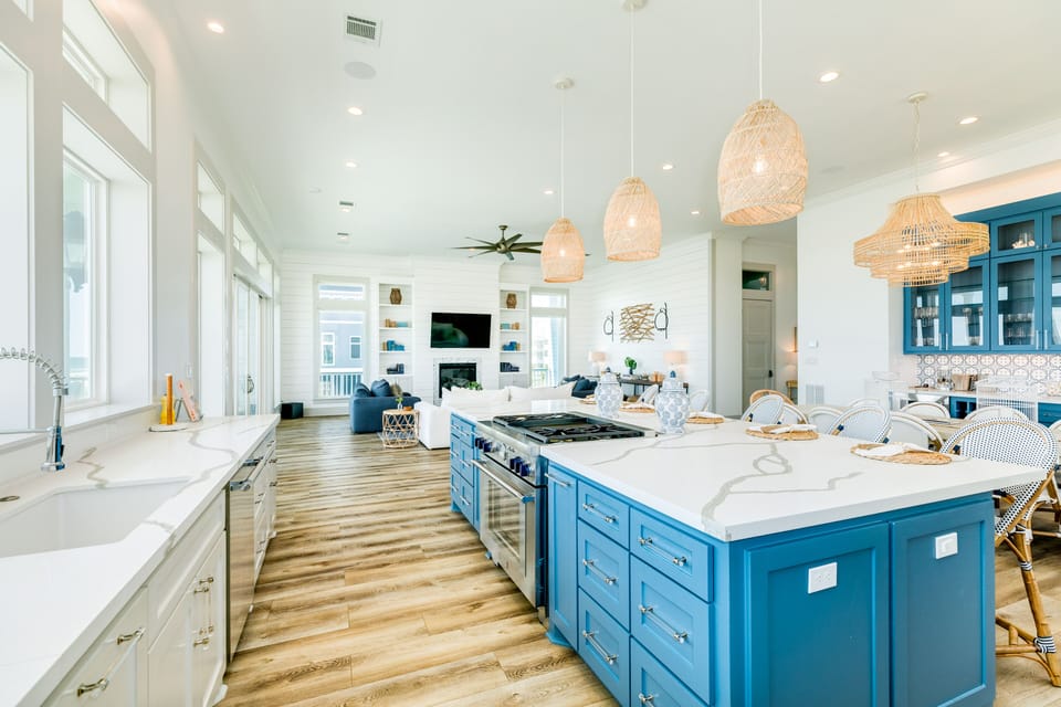 Large kitchen island provides cooking and eating space