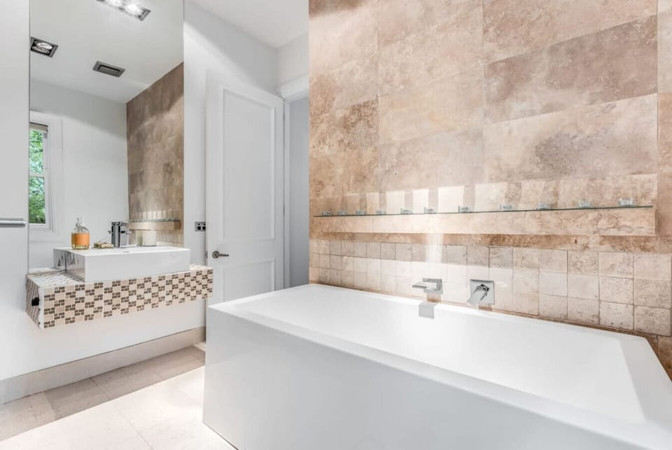 Downstairs bathroom with freestanding bath