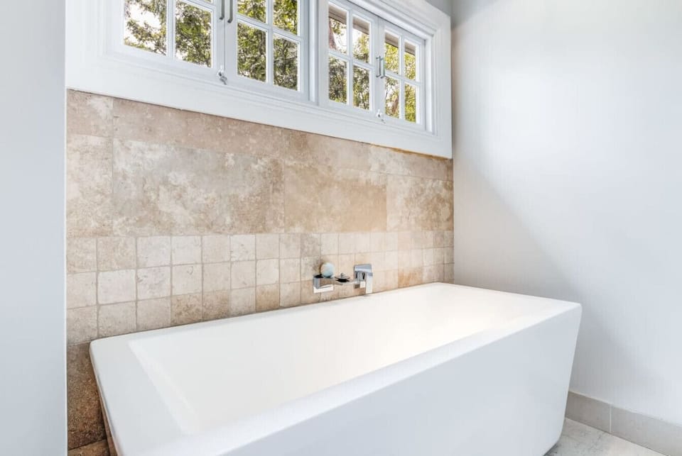 Upstairs bathroom with freestanding bath