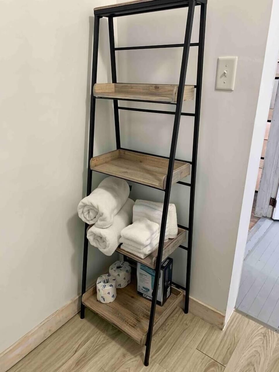 Master bathrooms storage shelf for guest supplies

blow dryer provided