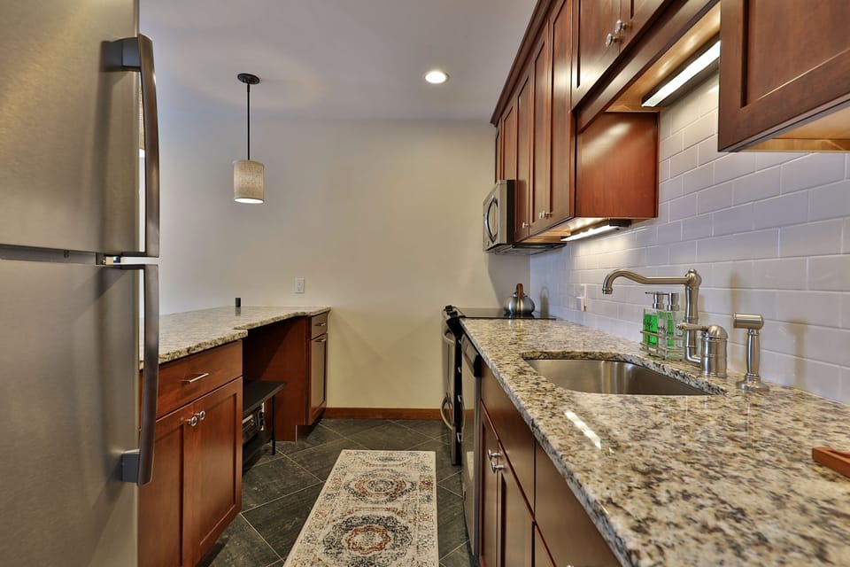 Fully equipped elegant galley style kitchen