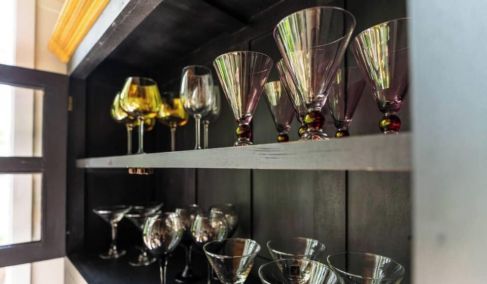 Plenty of gorgeous glass & plastic cocktail glasses.