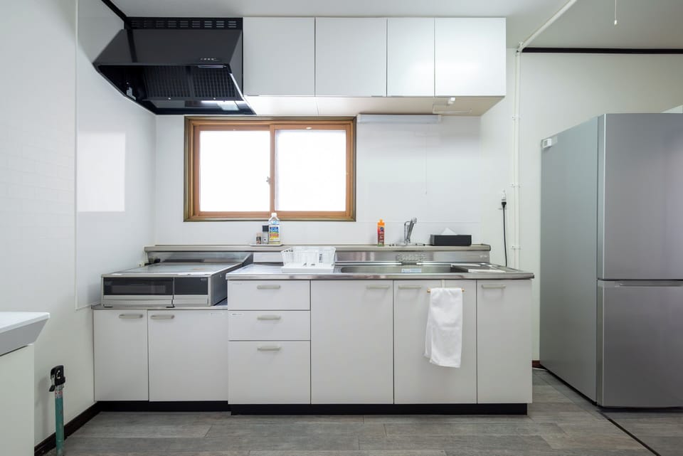 Comfort Condo | Private kitchen | Electric kettle, toaster, cookware/dishes/utensils