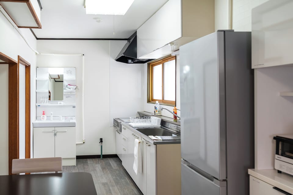 Comfort Condo | Private kitchen | Electric kettle, toaster, cookware/dishes/utensils