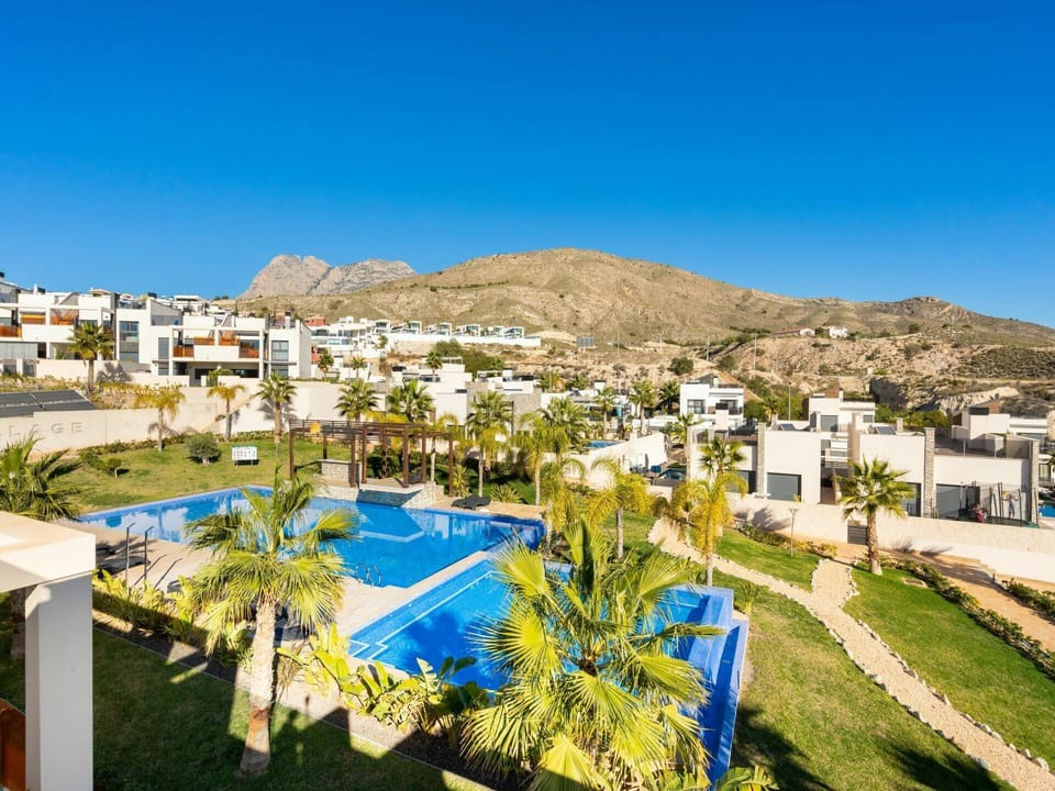 Sky, Daytime, Plant, Building, Azure, House, Swimming Pool, Tree, Body Of Water, Mountain