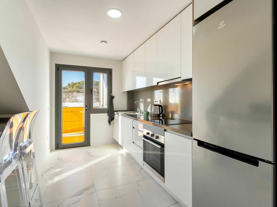Cabinetry, Countertop, Building, Kitchen, Interior Design, Kitchen Appliance, Wood, Window, Floor