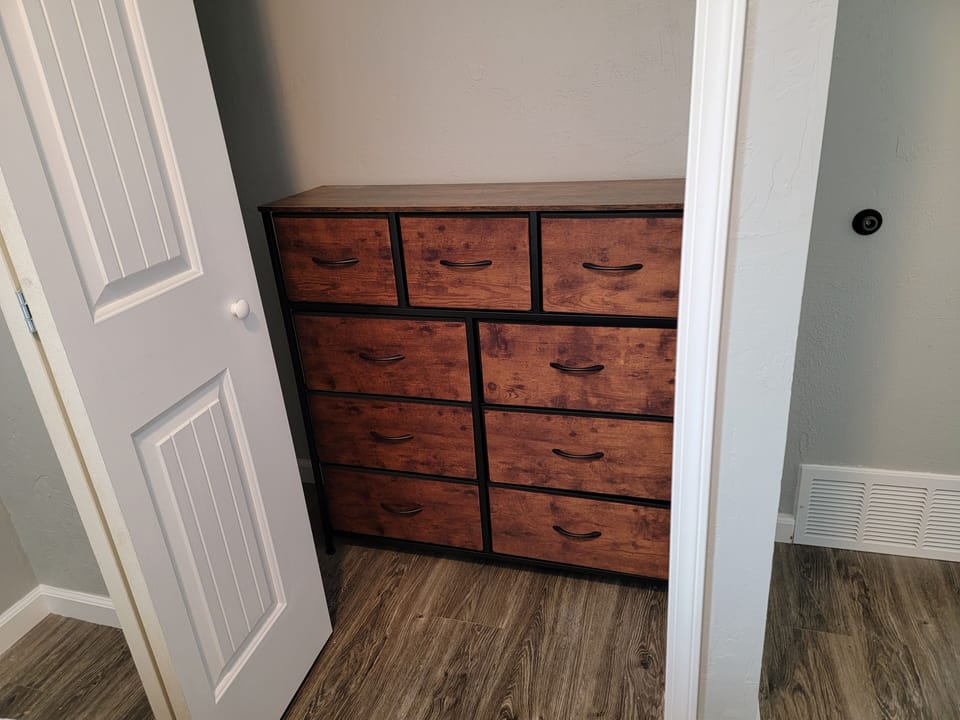 2nd bedroom dresser, full closet, Tucked away so this provides space! Small room