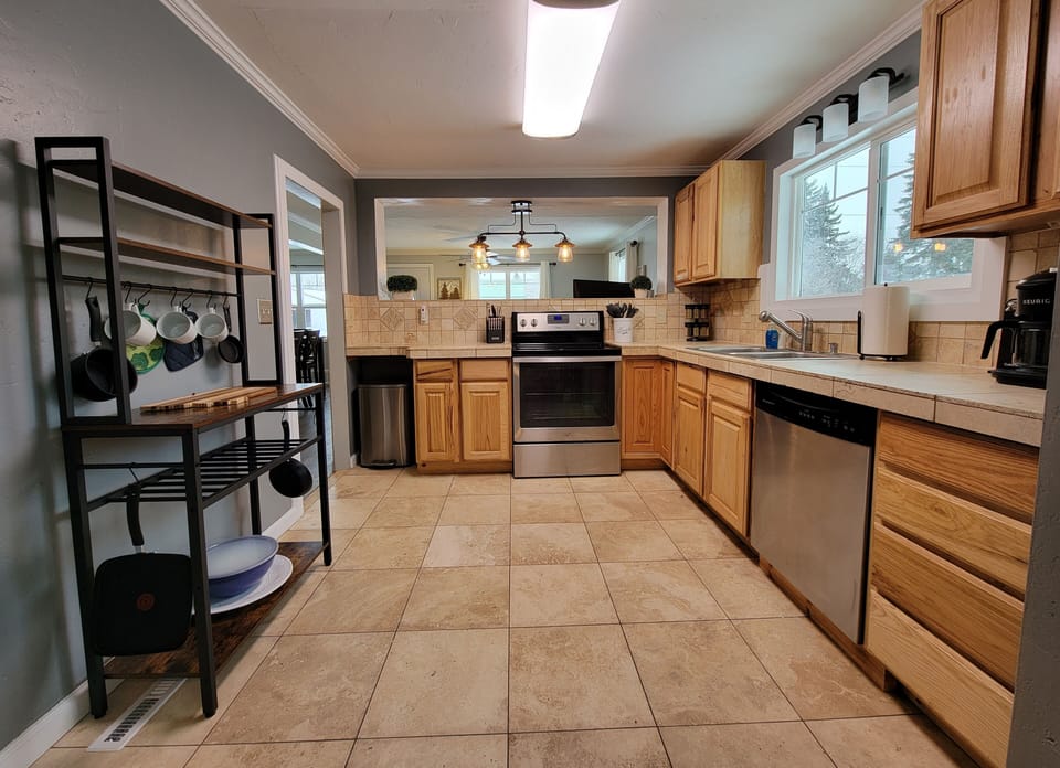 Full Kitchen with dishwasher, range, chefs pantry, and dual Keurig (pod or drip)