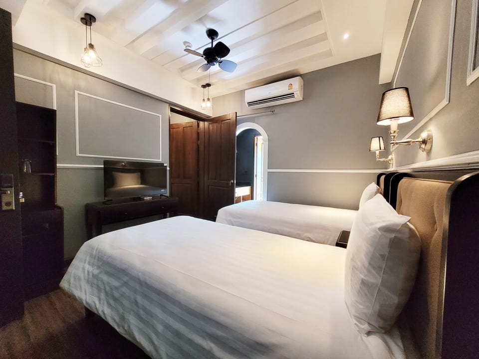 Desk, iron/ironing board, WiFi (free), bed sheets