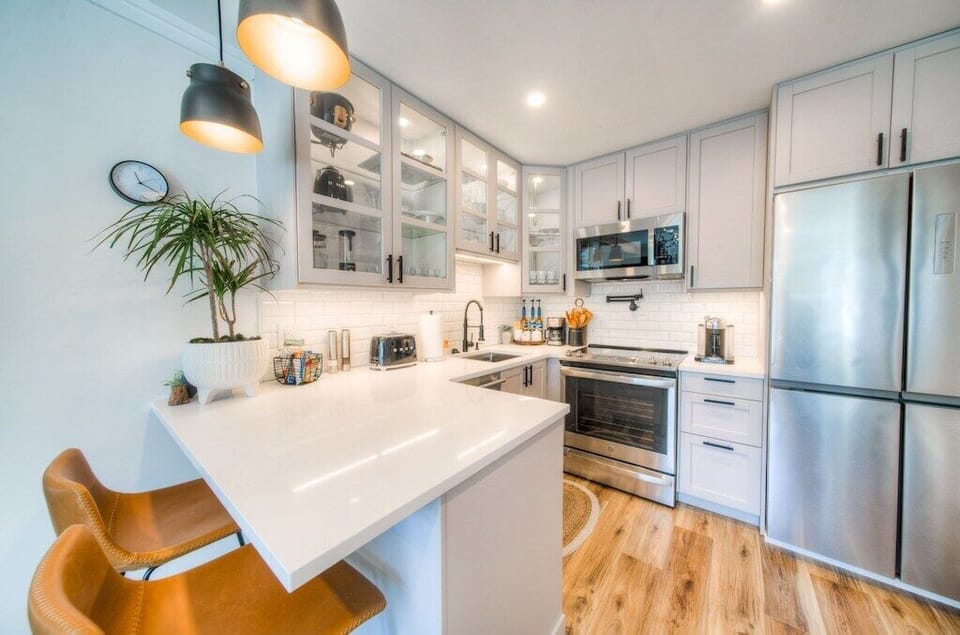 Full equipped kitchen with full size refrigerator makes it easy to prepare your favorite meal after a day on the mountain