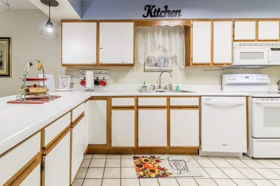 Kitchen equipped with full size Appliances.