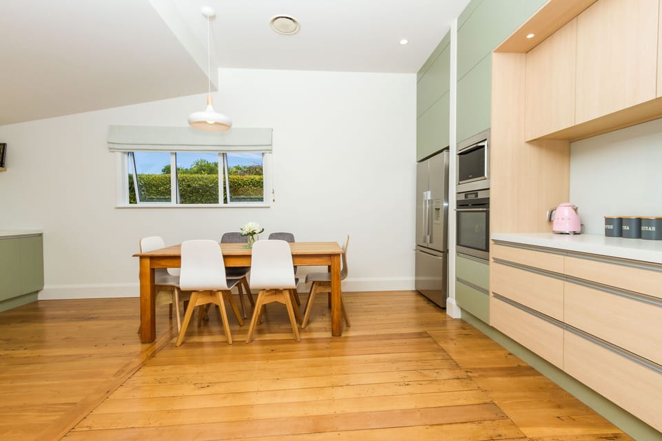 Fully-equipped kitchen with large dining table
