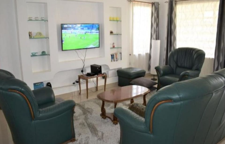 House, 3 Bedrooms | Living area | Flat-screen TV