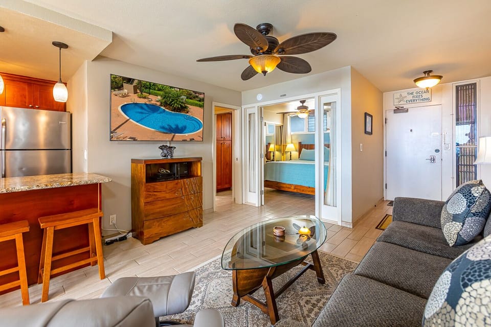 Living room features a sleeper sofa