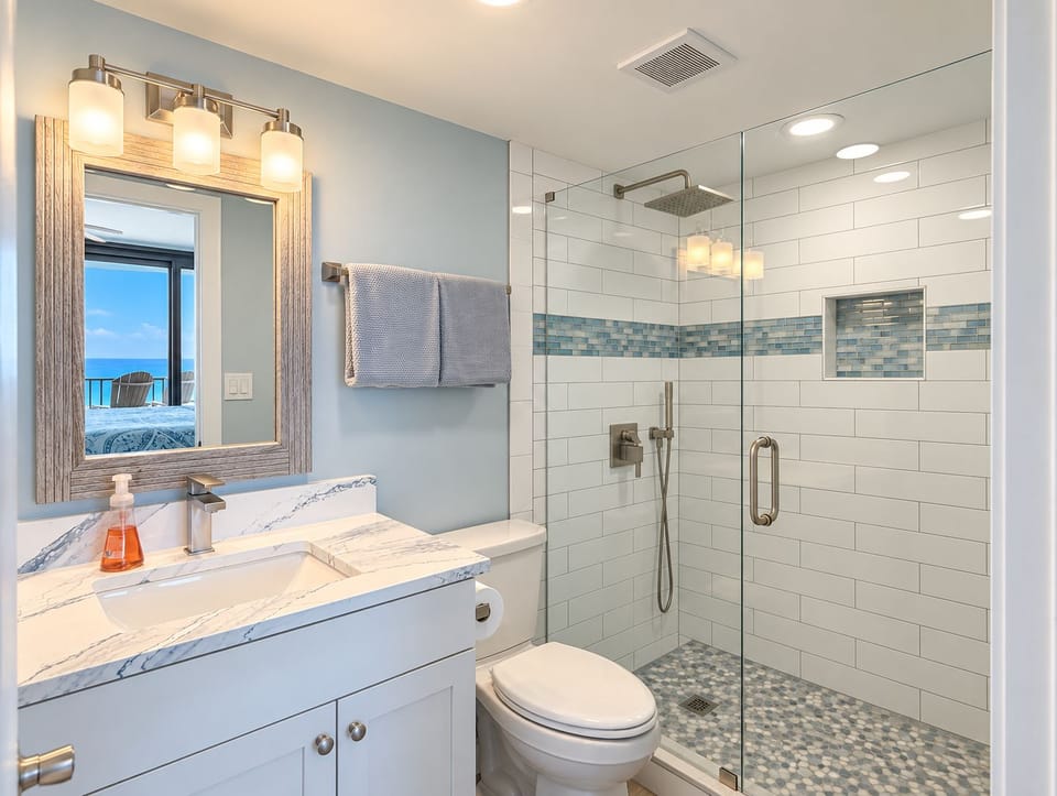 En-suite bathroom with a modern walk-in shower.