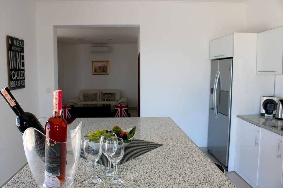Airy kitchen opening into the lounge