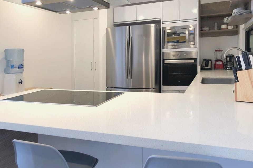 The kitchen has all new stainless steel appliances