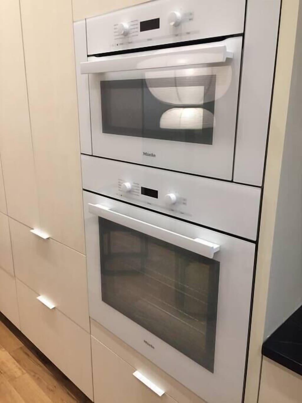 The chef's kitchen includes a microwave + speed oven and a large oven.