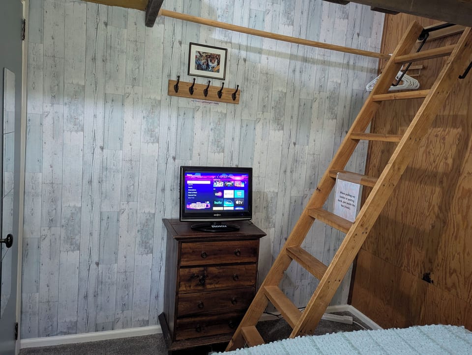 Two tv's. Living room & primary bedroom. Both use "guest ROKU." Bring your streaming passwords or watch free tv offered. This is a small tv in the primary bedroom.