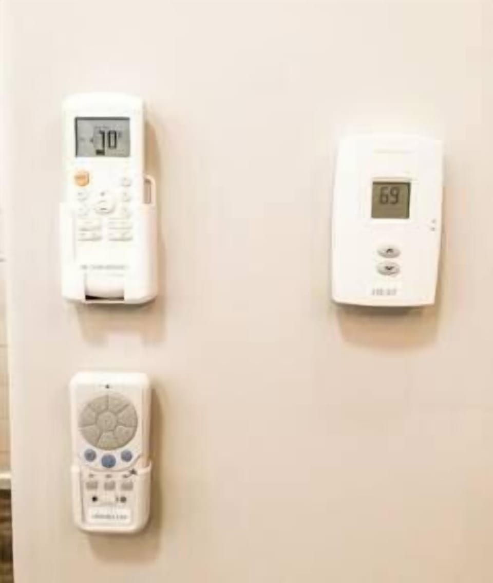 Labelled remotes for ceiling fan, heat, and AC