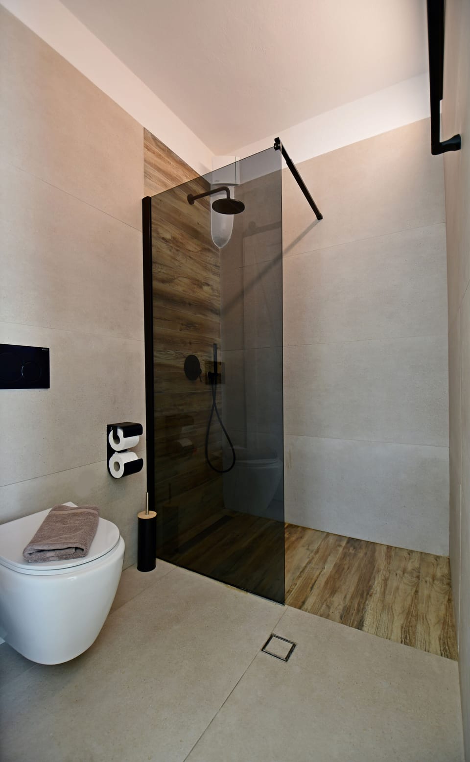 Shower, rainfall showerhead, designer toiletries, hair dryer