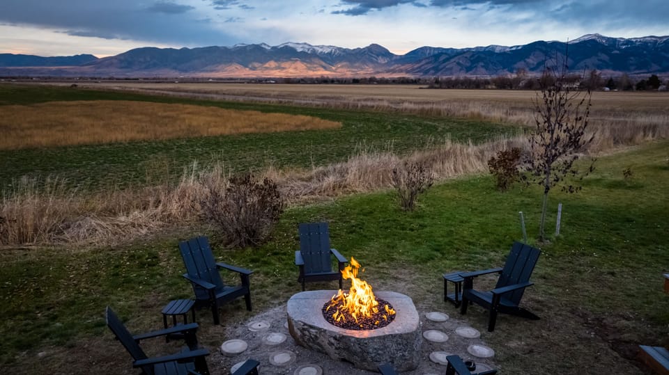 Enjoy mountain sunsets around the home's outdoor fire pit.