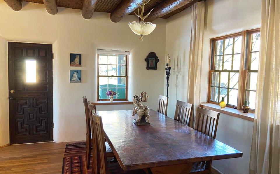 Dining area leads out to front door.