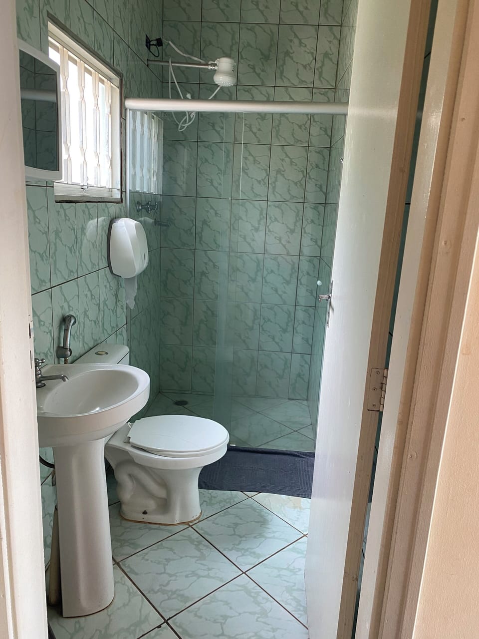 Shower, towels, soap, shampoo